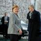 German Chancellor Angela Merkel (l) and British Prime Minister Theresa May