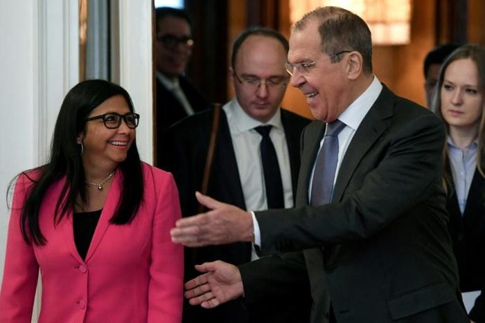 Russian Foreign Minister Sergei Lavrov, right, speaks with Venezuelan Vice President Delcy Rodriguez during a meeting in Moscow on March 1, 2019