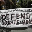 The protest came weeks after the new conservative government sent police to clear out four building squats in the bohemian Athens district of Exarchia, removing 143 migrants who had found shelter there