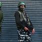 Indian paramilitary troopers stand guard during a lockdown in Srinagar