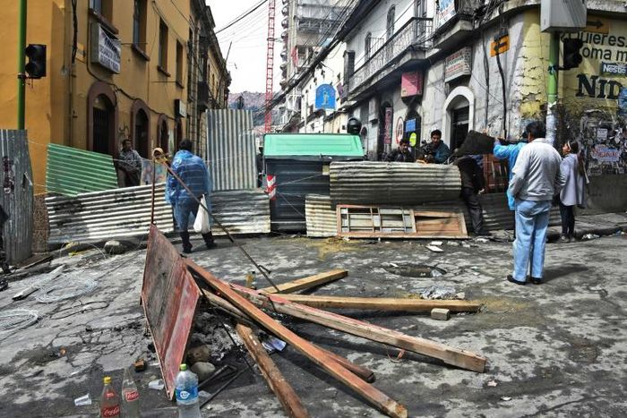 People block a street near the main square in La Paz after Evo Morales resigned as president