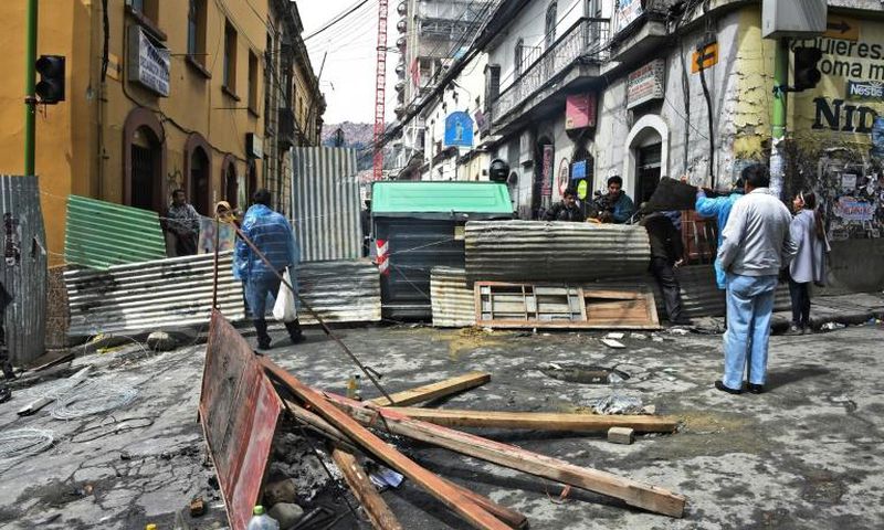 People block a street near the main square in La Paz after Evo Morales resigned as president