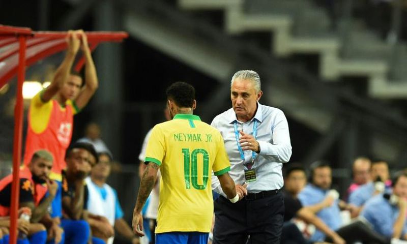 Neymar limps off after just 12 minutes of Brazil's 1-1 draw with Nigeria in Singapore