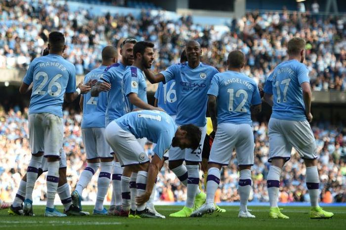 Manchester City celebrate another goal in their 8-0 rout of Watford