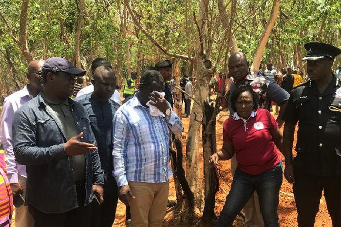 Kwaku Ofori Asiamah wept uncontrollably at the mass burial site