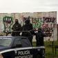 In a file photo from 2018, Mexican police in Michoacan state, where 14 officers were killed in an ambush on October 14, 2019