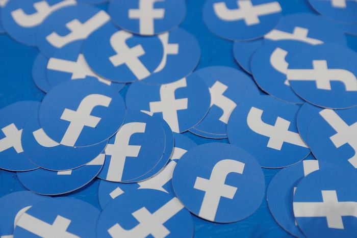 FILE PHOTO: Stickers bearing the Facebook logo are pictured at Facebook Inc's F8 developers conference in San Jose, California, U.S., April 30, 2019.  REUTERS/Stephen Lam/File Photo