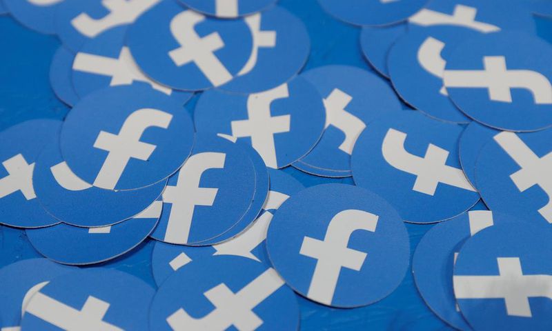 FILE PHOTO: Stickers bearing the Facebook logo are pictured at Facebook Inc's F8 developers conference in San Jose, California, U.S., April 30, 2019.  REUTERS/Stephen Lam/File Photo