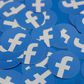 FILE PHOTO: Stickers bearing the Facebook logo are pictured at Facebook Inc's F8 developers conference in San Jose, California, U.S., April 30, 2019.  REUTERS/Stephen Lam/File Photo