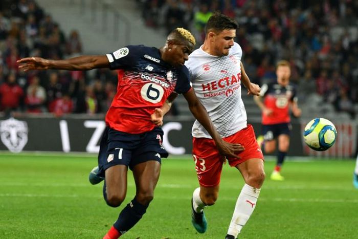 Nigeria forward Victor Osimhen claimed a late point for Lille with his seventh league goal of the season
