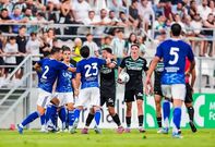 Real Betis and Como fight