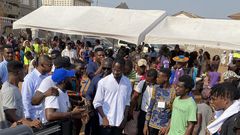 Mr Eazi and Joeboy feed kids in Jamestown on Boxing Day with Ghana rice