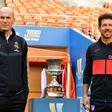 Zinedine Zidane and Diego Simeone pose next to the Spanish Super Cup trophy on the eve of the final in Jeddah