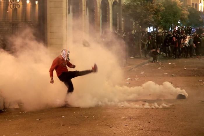 Beirut saw a second night of clashes between demonstrators throwing water bottles and firecrackers and security forces using tear gas and water cannon
