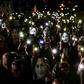 Maltese journalist Daphne Caruana Galizia, seen here protesters' photos, was killed by a carbomb in 2017