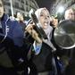 Algerians bang on pots and pans as they protest against the December 12 presidential election they say will cement in power a political elite rejected by the people