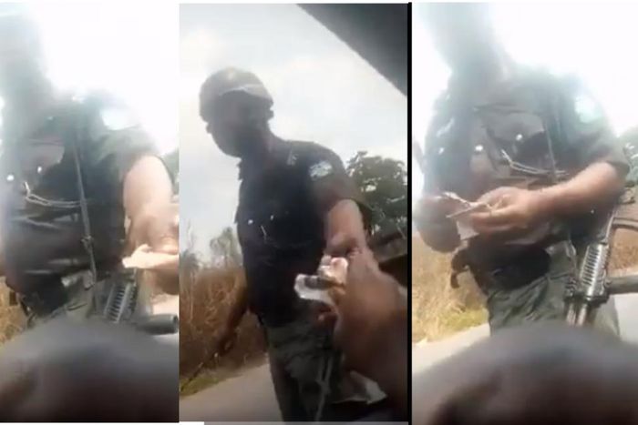 Police officer gives change to driver after taking bribe (video)