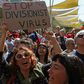 The closure of crossings on the divided island of Cyprus over fears of the spread of coronavirus has sparked angry protests