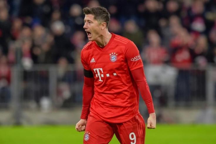 Polish forward Robert Lewandowski netted twice in Bayern Munich's 3-2 league win over bottom side Paderborn