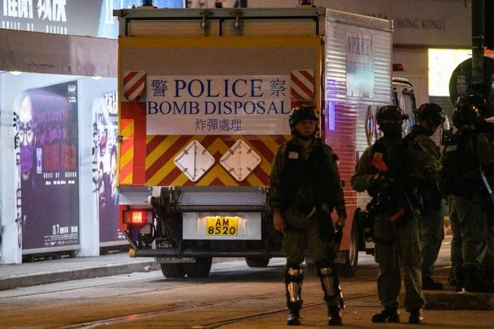 Bomb disposal officers have disabled two homemade nail bombs at a school in Hong Kong