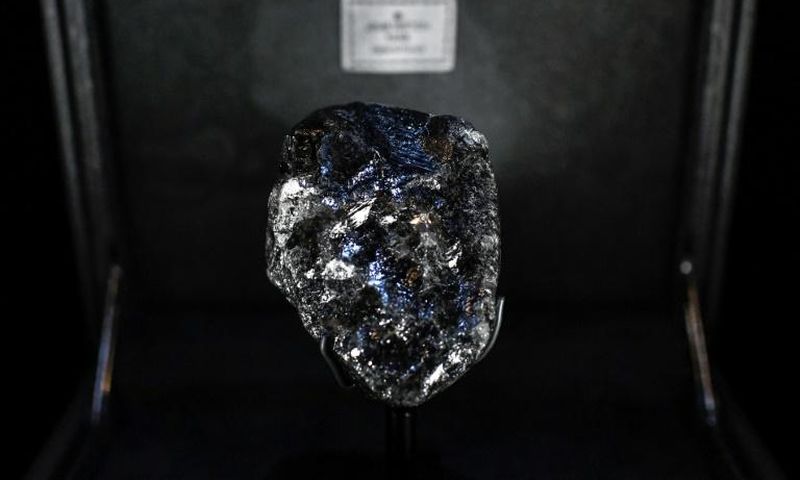 This picture taken on January 21, 2020, shows the world's second- biggest rough diamond named "Sewelo" displayed at Place Vendome's Louis Vuitton luxury shop in Paris.
