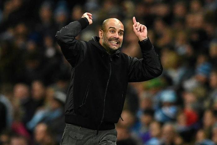 Pep Guardiola gestures on the touchline during Manchester City's Premier League match against Chelsea