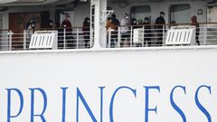 Passengers on the Diamond Princess are confined to their cabins except for brief outings on open decks wearing facemasks