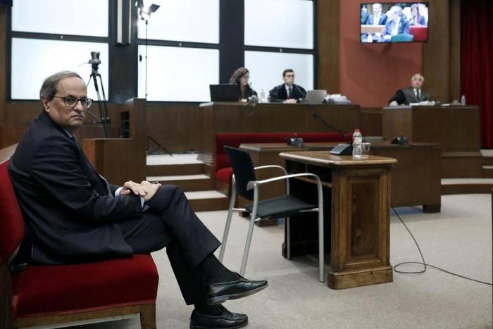 Catalan regional president Quim Torra told the court in Barcelona he had disobeyed orders from electoral authorities to take separatist symbols down from public buildings