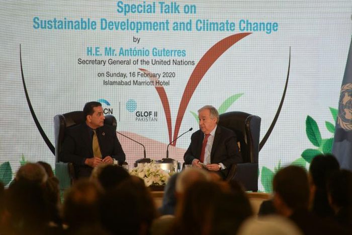 United Nations Secretary-General Antonio Guterres (R), pictured during a question and answer session at an event on sustainable development and climate change in Islamabad, said "too many decision makers continue to fiddle" while the plant burns