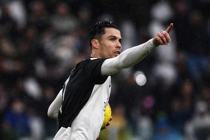Cristiano Ronaldo celebrates after scoring a penalty in Turin.