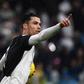 Cristiano Ronaldo celebrates after scoring a penalty in Turin.
