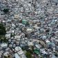 Aerial view of the high density of houses in the neighbourhood of Jalousie in Port-au-Prince, on March 12, 2020