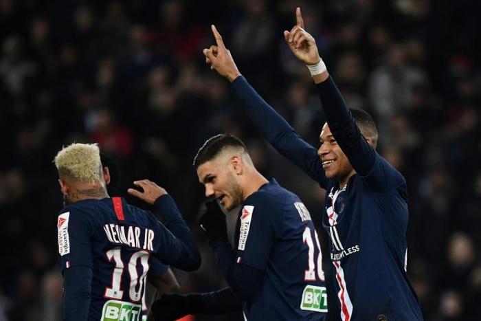 Star man: Kylian Mbappe celebrates after scoring on Wednesday