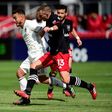 Major League Soccer players such as Colorado's Andre Shinyashiki, left, and DC United's Frederic Brillant, right, will have to wait until at least May 10 before league matches return from a coronavirus shutdown, the league announced Thursday
