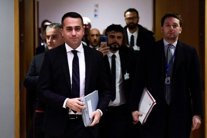 Di Maio (L) is credited by supporters with turning M5S into a mainstream political force capable of allying with right and left