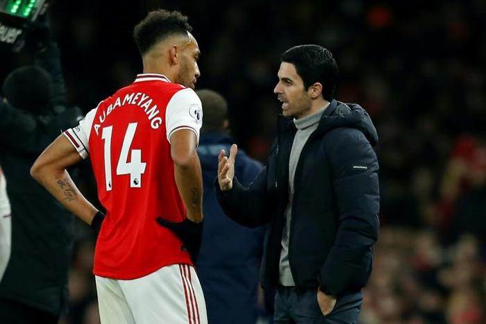 Pierre-Emerick Aubameyang (left) has been impressed by Mikel Arteta's impact at Arsenal