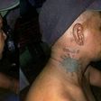 Man tattoos COVID-19 on his body