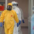 Putin used full protective gear during a visit last month to a hospital treating coronavirus patients