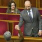 Ukraine's new PM Denys Shmygal accepts the congratulations of a fellow MP