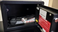 Guns in fingerprint-activated safes are placed in designated classrooms around Sidney High School in the US state of Ohio for a response team of teachers to use in case of an active shooter