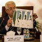 Palestinian president Mahmud Abbas shows maps of historical Palestine during a February 2020 Arab League meeting on President Donald Trump's proposed Middle East plan