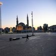 Istanbul's Taksim Square is deserted on April 12, 2020, during a two-day curfew to prevent the spread of COVID-19 -- Turkey's parliament approved a law that allows tens of thousands of prisoners to be freed as another safety measure