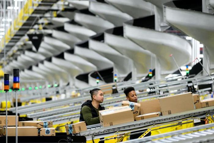 Amazon said it is implementing new safety measures including temperature checks for empoyees at warehouses as part of its efforts to contain the coronavirus pandemic