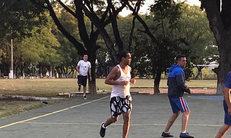 Ronaldinho has been pictured participating in a football tournament in a Paraguay prison