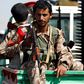 Yemeni Iran-backed Huthi rebels military police parade in the streets of the capital Sanaa in January
