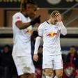 RB Leipzig pair Christopher Nkunku (L) and Timo Werner (R) show their frustration at Paderborn after their team leaked two second-half goals, but went top of the league after a 3-2 away win.