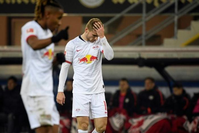 RB Leipzig pair Christopher Nkunku (L) and Timo Werner (R) show their frustration at Paderborn after their team leaked two second-half goals, but went top of the league after a 3-2 away win.