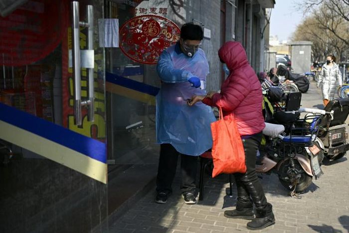 China has expelled three Wall Street Journal reporters over an op-ed headline authorities deemed racist