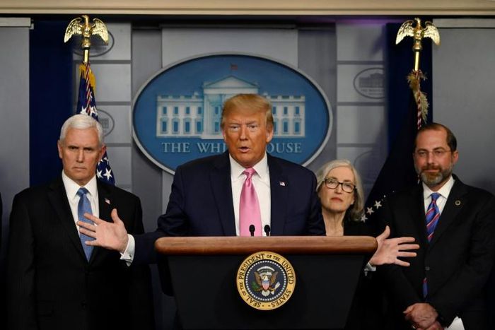 US President Donald Trump, flanked by Health and Human Services Secretary Alex Azar (R), US Vice President Mike Pence (L) and CDC Principal Deputy Director Anne Schuchat, holds a news conference on the COVID-19 outbreak