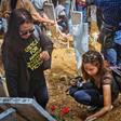 On the 10th anniversary, relatives visit the site of the massacre where markers represent the 58 victims of the November 23, 2009 killings